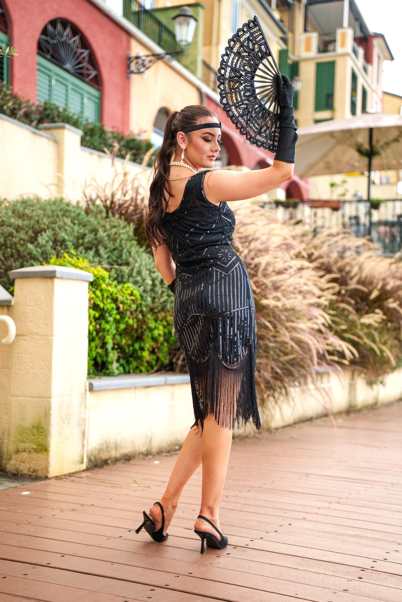 A 1920s Flapper Dress in Black with Scoop neckline, sequins, beads and fringes