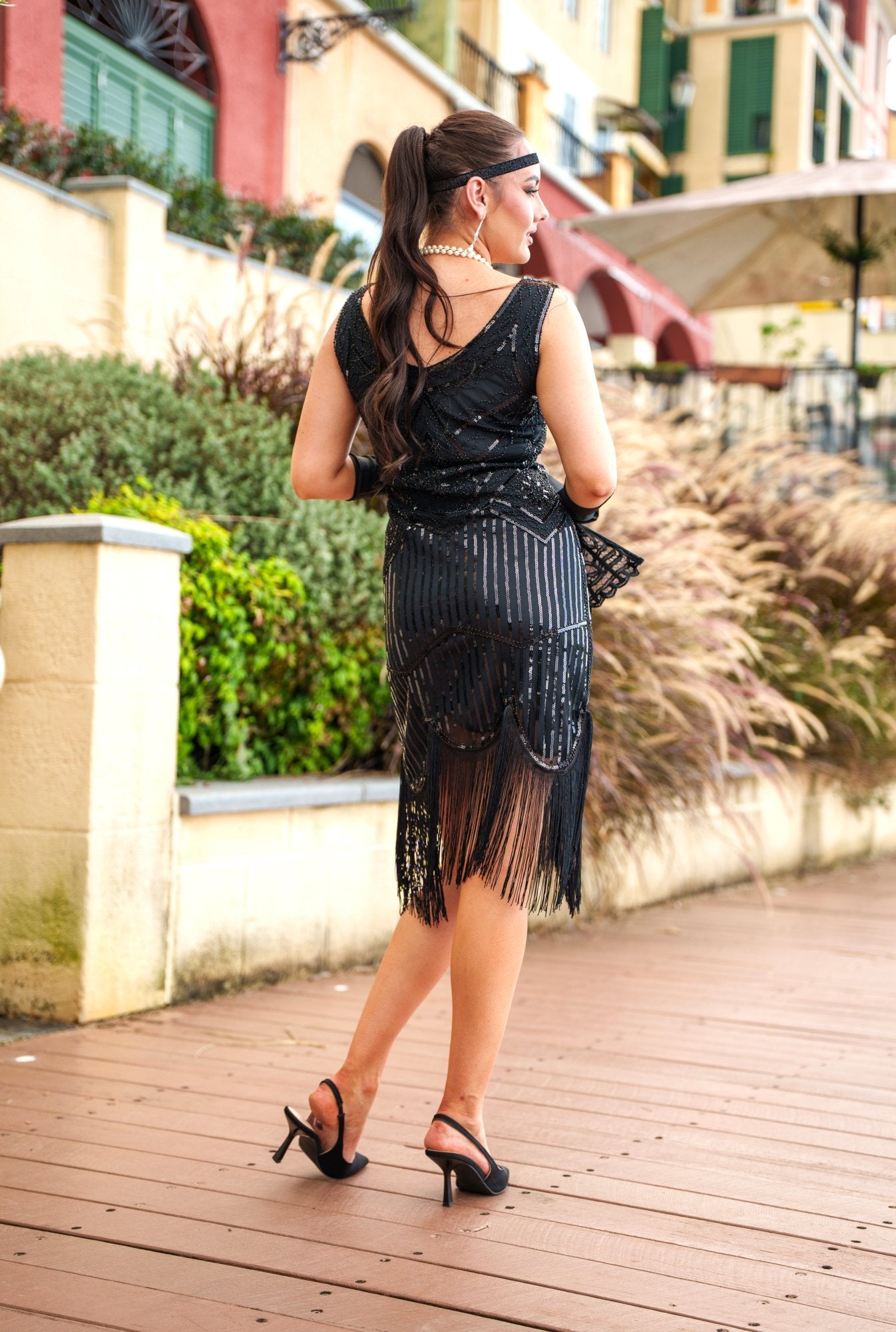 A 1920s Flapper Dress in Black with Scoop neckline, sequins, beads and fringes