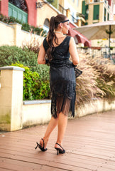 A 1920s Flapper Dress in Black with Scoop neckline, sequins, beads and fringes
