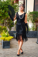 A 1920s Flapper Dress in Black with Scoop neckline, sequins, beads and fringes