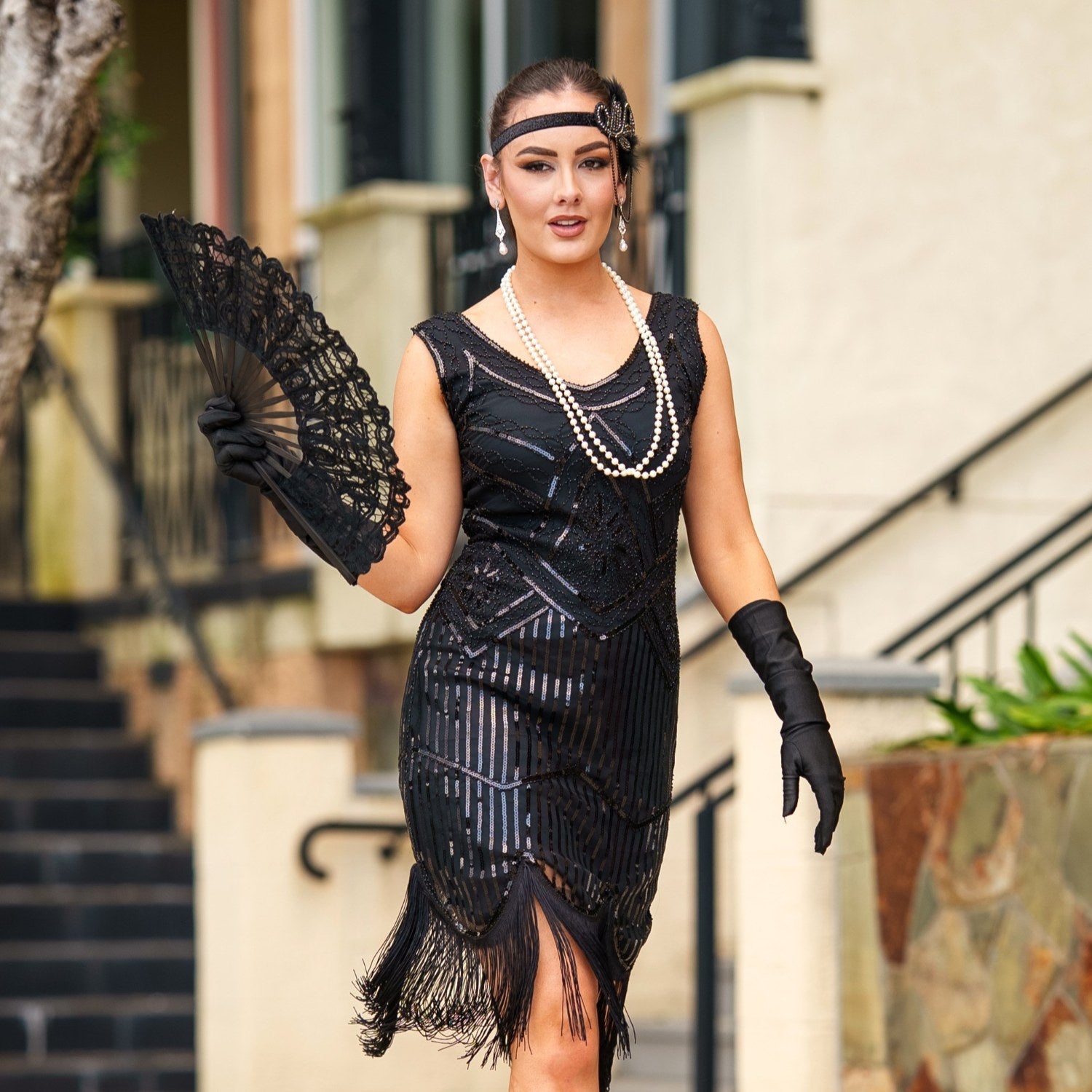 A 1920s Dress in Black with, Beads Sequins and Fringes