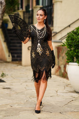 1920s Black and Gold Flapper Dress with sleeves – features sequins, beads, and fringe. Perfect for Gatsby parties
