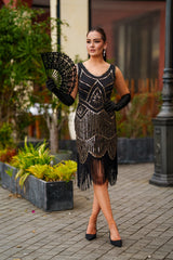 1920s Black and Gold Stella Flapper Dress with sequins, beads, and fringe – perfect for Gatsby themed parties
