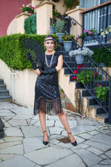 A black Roaring 1920s Flapper Dress