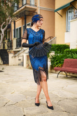A Stunning Blue 1920s Flapper Dress with Sleeves, Black Sequins, Black Beads and Fringes.