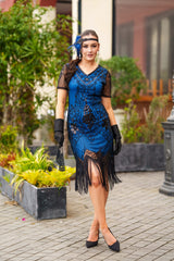 A Stunning Blue 1920s Flapper Dress with Sleeves, Black Sequins, Black Beads and Fringes.