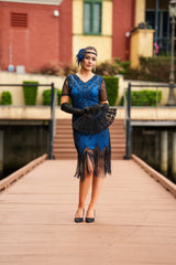 A Stunning Blue 1920s Flapper Dress with Sleeves, Black Sequins, Black Beads and Fringes.