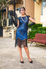 A 1920s Flapper Dress in Navy Blue. Modern Style with Beads, Sequins and Fringes around the Hem.