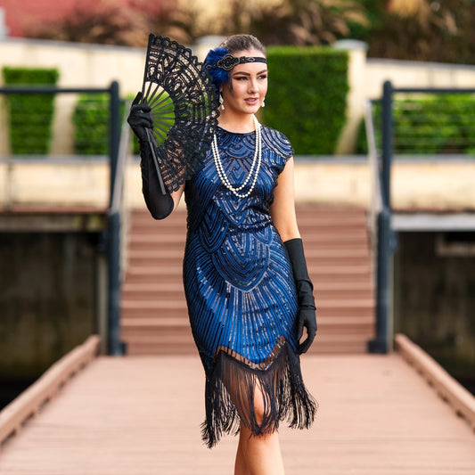 A Flapper Dress 1920s in Navy Blue. Modern Style with Beads, Sequins and Fringes around the Hem.