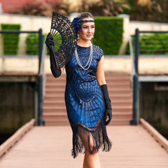 A Flapper Dress 1920s in Navy Blue. Modern Style with Beads, Sequins and Fringes around the Hem.