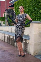 1920s Black and Gold Cleo Flapper Dress with sequins, beads, and fringe – perfect for Gatsby themed parties