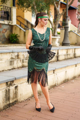 A stunning Green 1920s Flapper Dress with sequins, beads and fringes