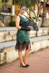 A stunning Green 1920s Flapper Dress with sequins, beads and fringes