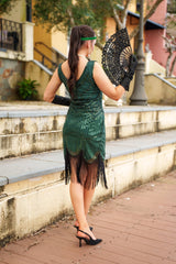 A stunning Green 1920s Flapper Dress with sequins, beads and fringes
