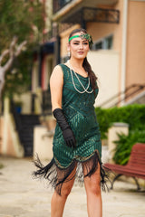 A stunning Green 1920s Flapper Dress with sequins, beads and fringes