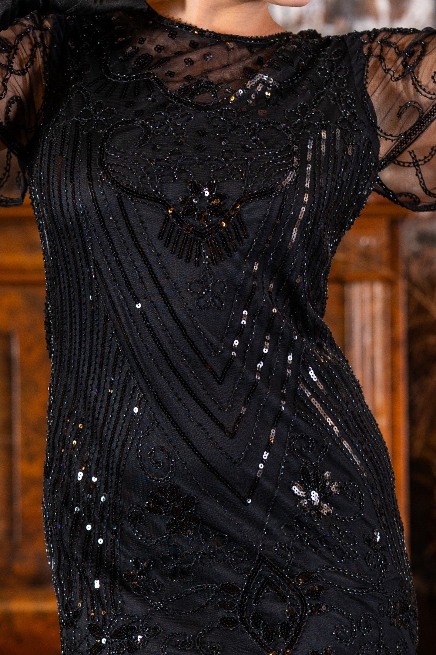 A Black 1920s Short Flapper Dress with sleeves