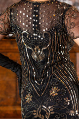 A Black & Gold 1920s Short Flapper Dress with sleeves
