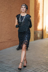 A black Roaring 1920s Flapper Dress