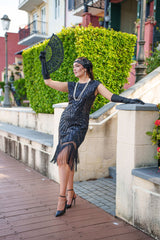A black Roaring 1920s Flapper Dress
