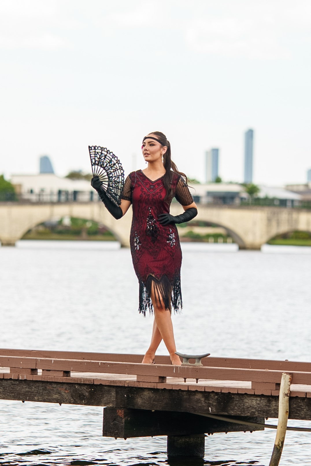 A Stunning Red 1920s Flapper Dress with Sleeves, Black Sequins, Black Beads and Fringes.