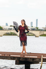 A Stunning Red 1920s Flapper Dress with Sleeves, Black Sequins, Black Beads and Fringes.