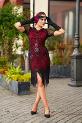 A Stunning Red 1920s Flapper Dress with Sleeves, Black Sequins, Black Beads and Fringes.