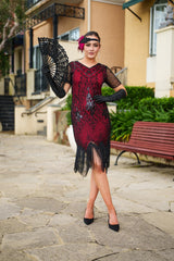 A Stunning Red 1920s Flapper Dress with Sleeves, Black Sequins, Black Beads and Fringes.