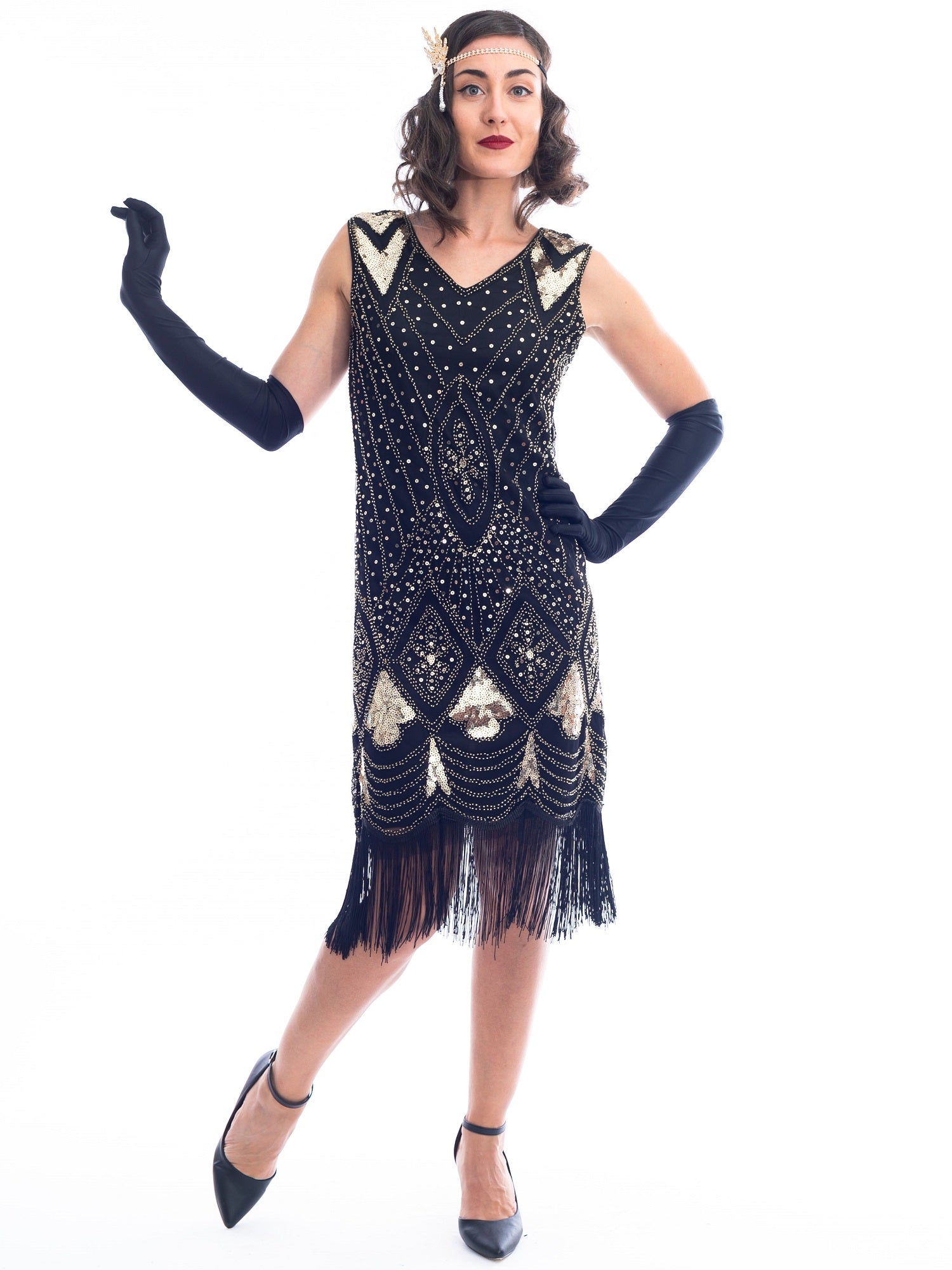 A black and gold sleeveless 1920's Flapper Dress with sequins and beads