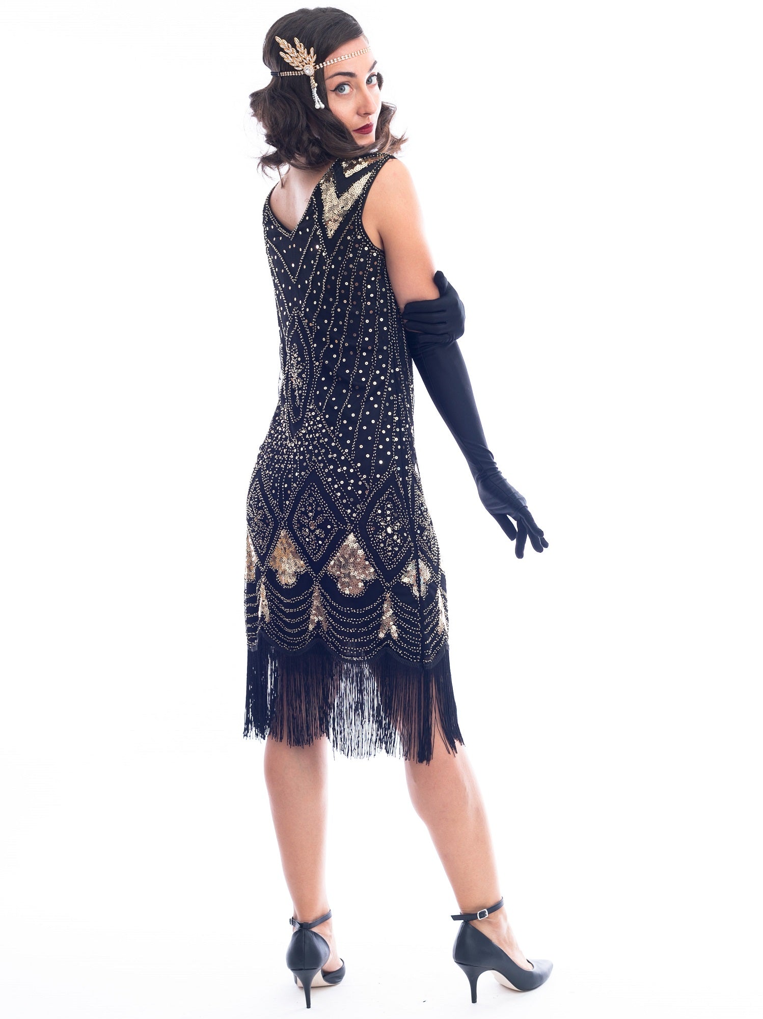 A black and gold sleeveless 1920's Flapper Dress with sequins and beads