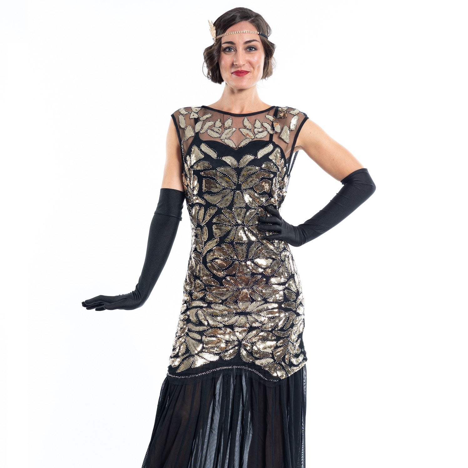 A long black flapper dress gold sequins and beads