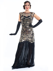A long black flapper dress gold sequins and beads