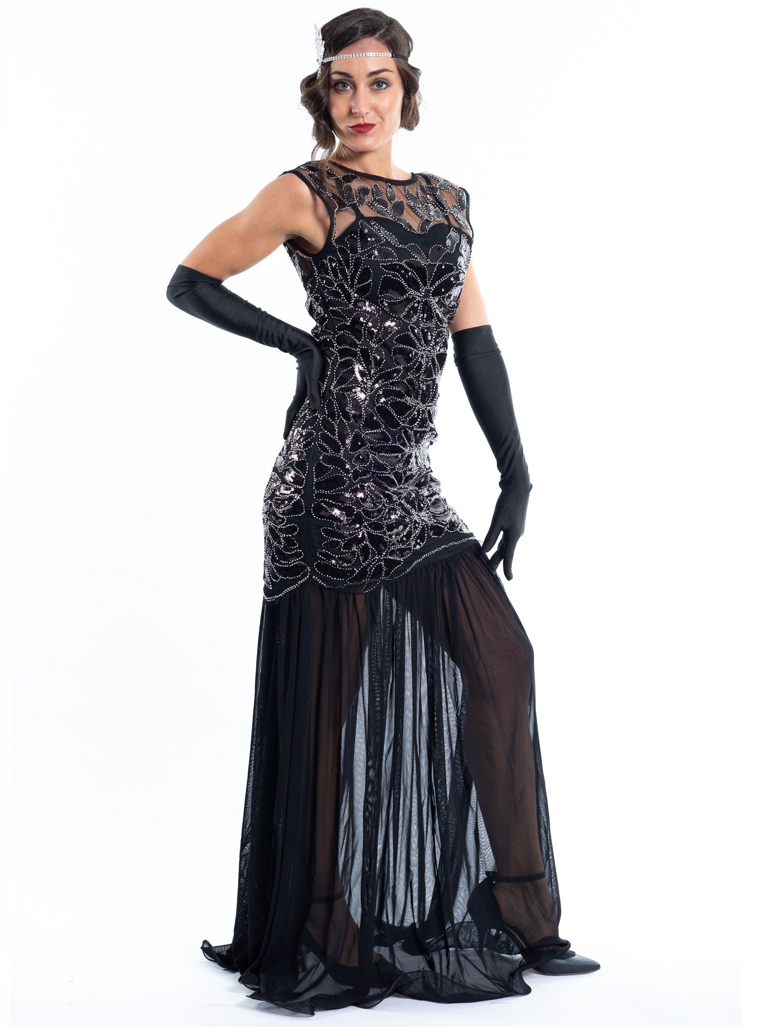 A long black flapper dress with black sequins and silver beads