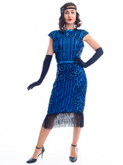 A 1920s Blue Flapper Dress with blue sequins, black beads and fringes around hem