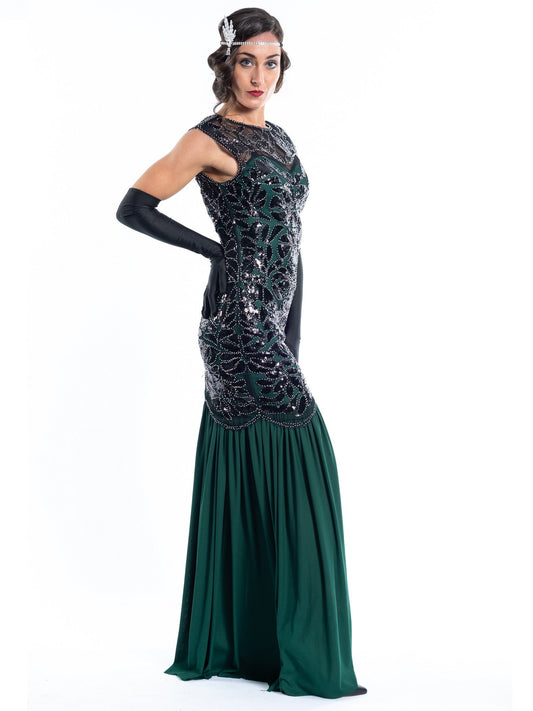 A long green flapper dress with black sequins and beads