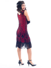 A back view of a Red Gatsby Dress with deco pattern of black sequins and beads.