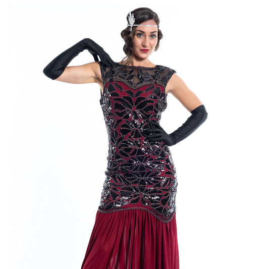 A long red flapper dress with black sequins and silver beads