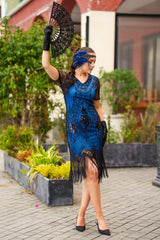 A Stunning Blue 1920s Flapper Dress with Sleeves, Black Sequins, Black Beads and Fringes. 