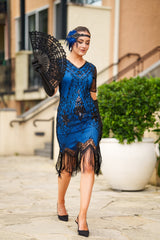 A Stunning Blue 1920s Flapper Dress with Sleeves, Black Sequins, Black Beads and Fringes. 