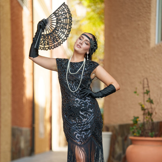Close up of 1920s Black Cleo Flapper Dress with sequins, beads, and fringe – perfect for Gatsby or Roaring 20s parties