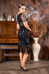 A 1920s Black & Silver Sequin Gatsby Dress with SleevesA 1920s Black & Silver Sequin Gatsby Dress with Sleeves