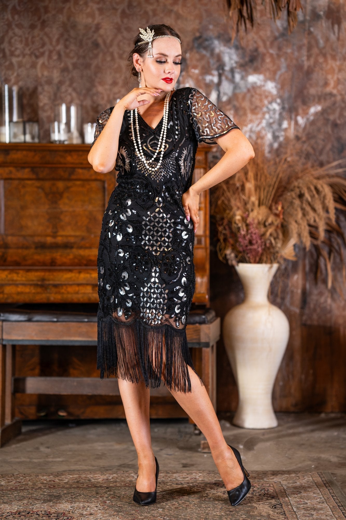 A 1920s Black & Silver Sequin Gatsby Dress with SleevesA 1920s Black & Silver Sequin Gatsby Dress with Sleeves