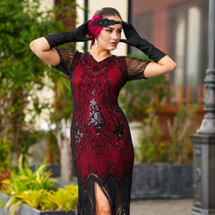 A Stunning Red 1920s Flapper Dress with Sleeves, Black Sequins, Black Beads and Fringes. 