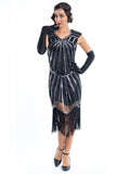 A black flapper dress with silver sequins and beads