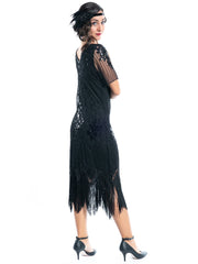 A Plus Size Black Gatsby Dress with sleeves, sequins and beads