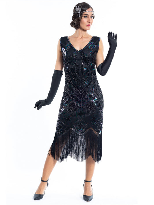 A vintage 1920s black great gatsby dress with sequins and beads