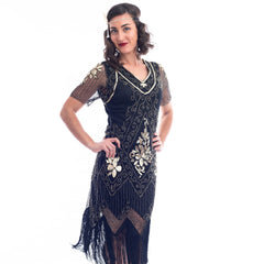 A Black Plus Size Gatsby Dress with gold sequins, beads and sleeves