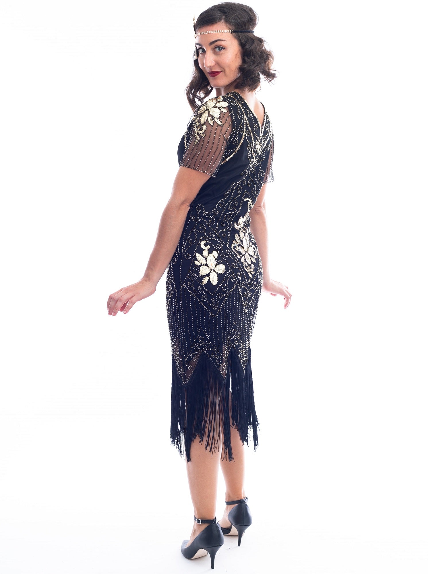 A Black Plus Size Gatsby Dress with gold sequins, beads and sleeves
