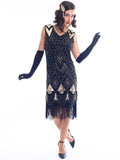A black and gold sleeveless 1920's Flapper Dress with sequins and beads