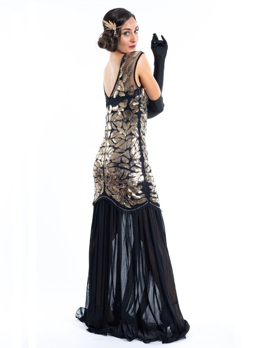 A long black flapper dress gold sequins and beads