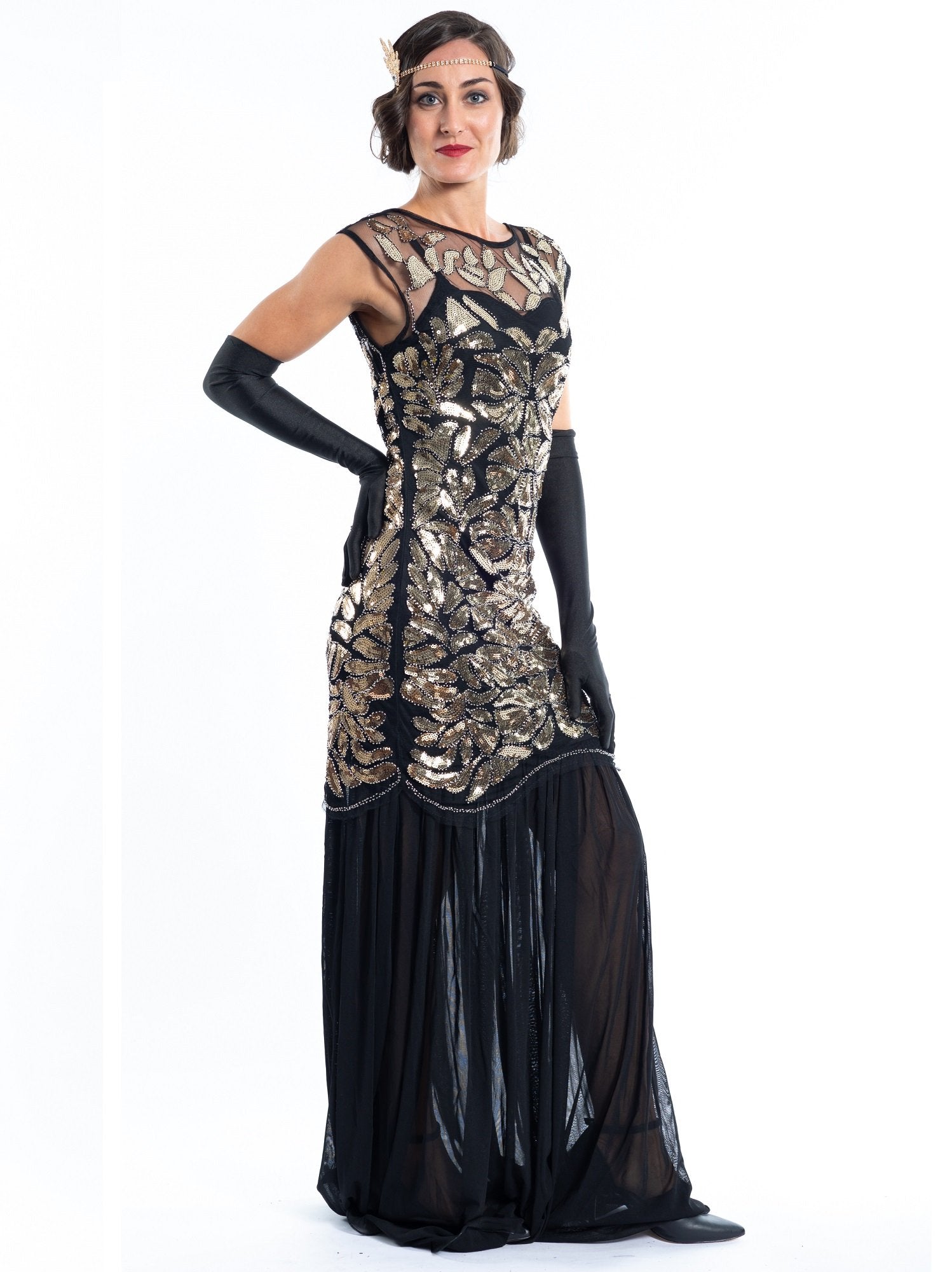 A long black flapper dress gold sequins and beads